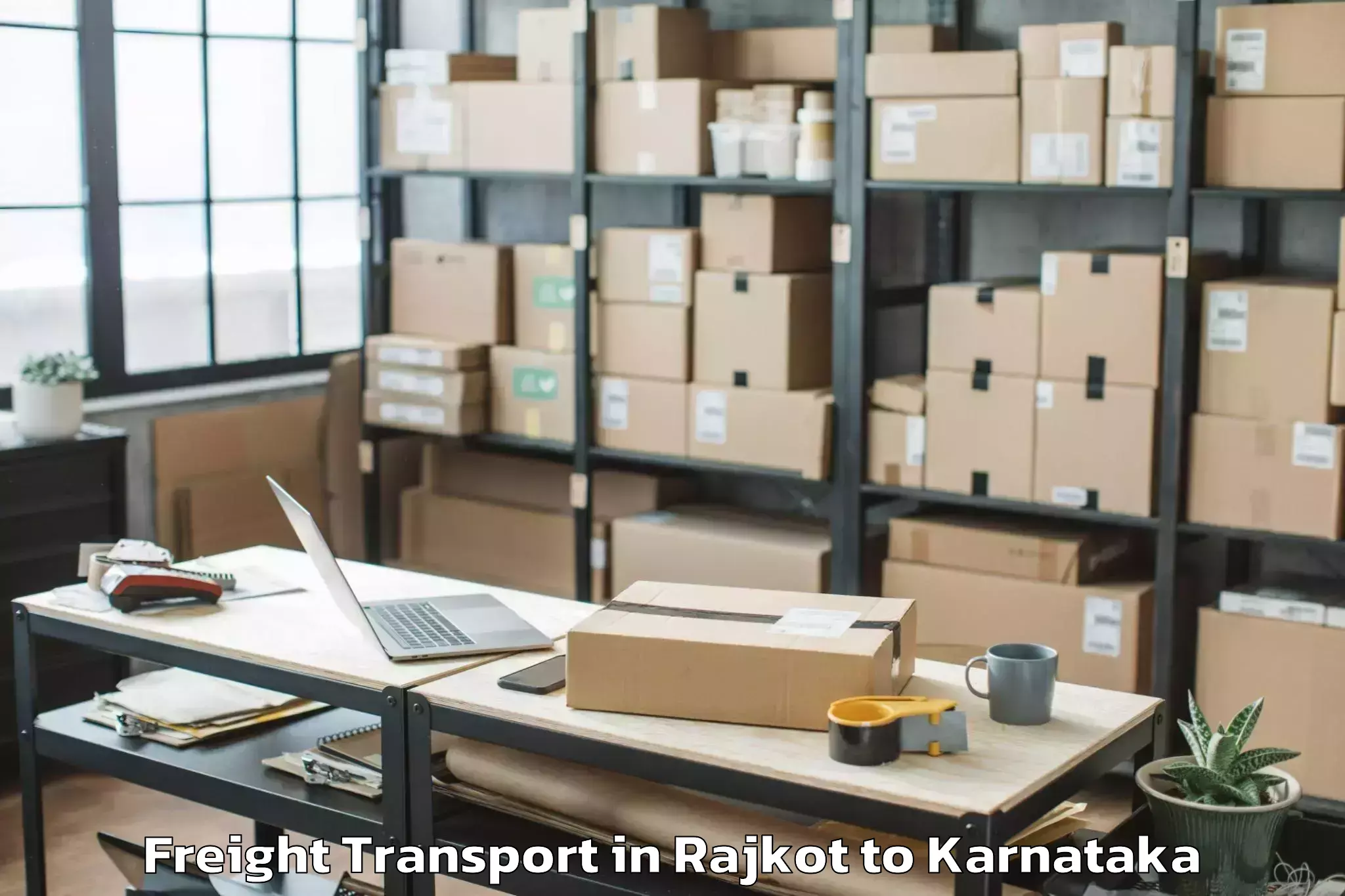 Book Rajkot to University Of Agricultural Sci Freight Transport Online